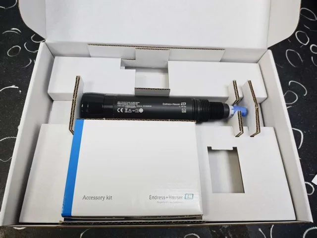 Endress+Hauser COS51E opened package with sensor and accessory kit